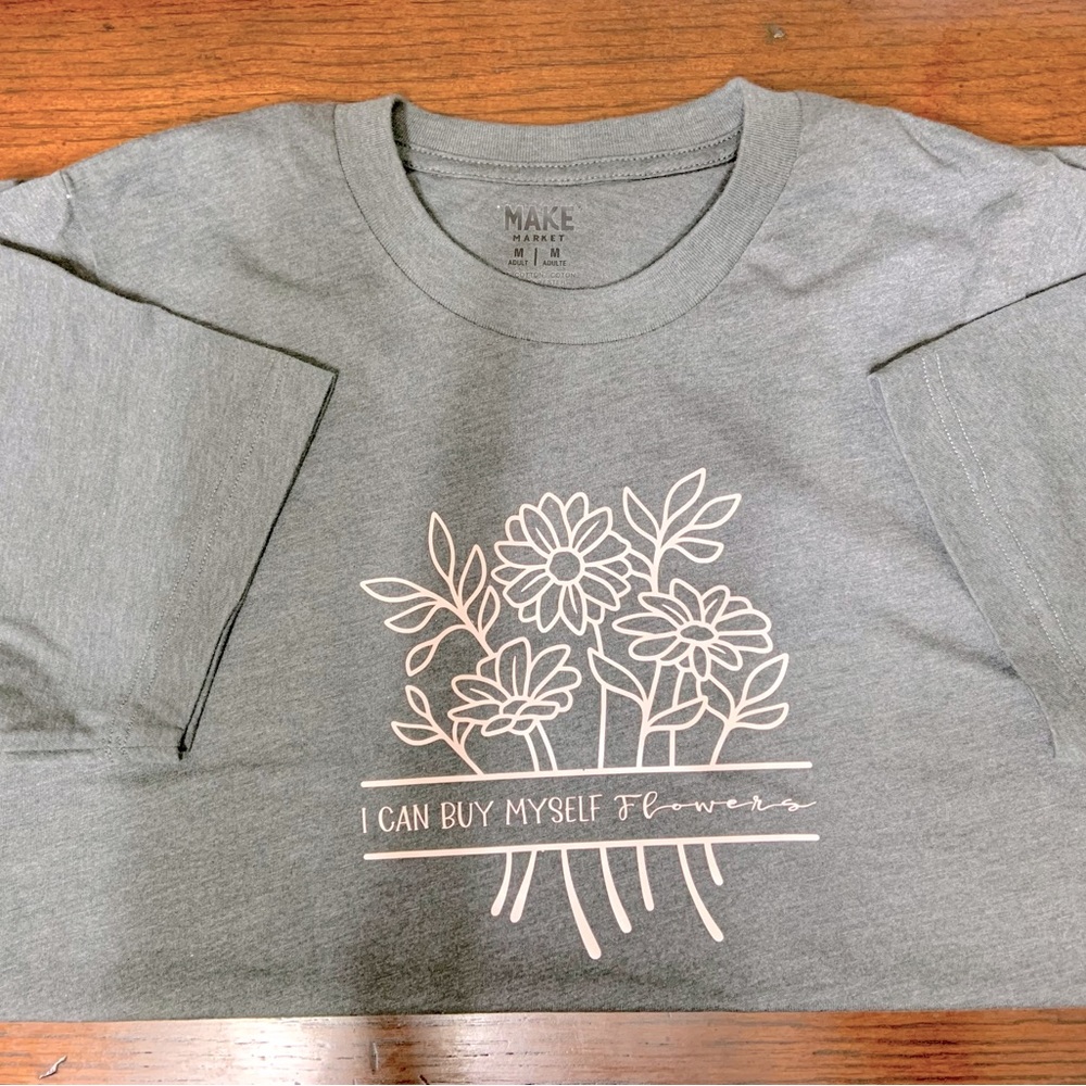 Custom made tee.  Get yours today 💐